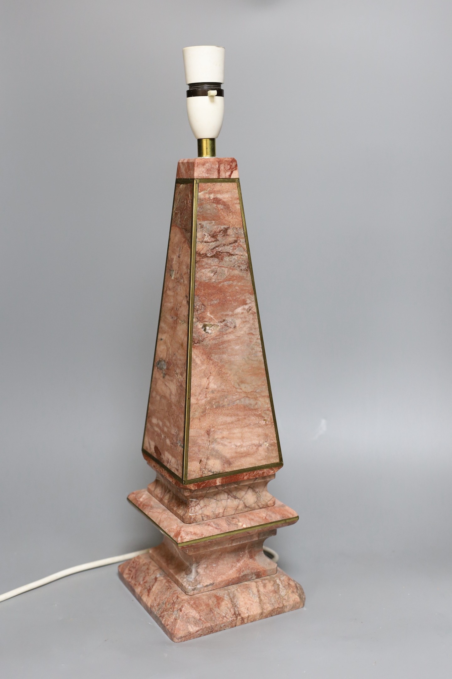 A single pink marble obelisk style desk lamp, 49cm tall